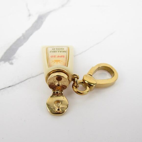 Juicy Couture Malibu Gold Tan Oil Charm - Picture 6 of 7